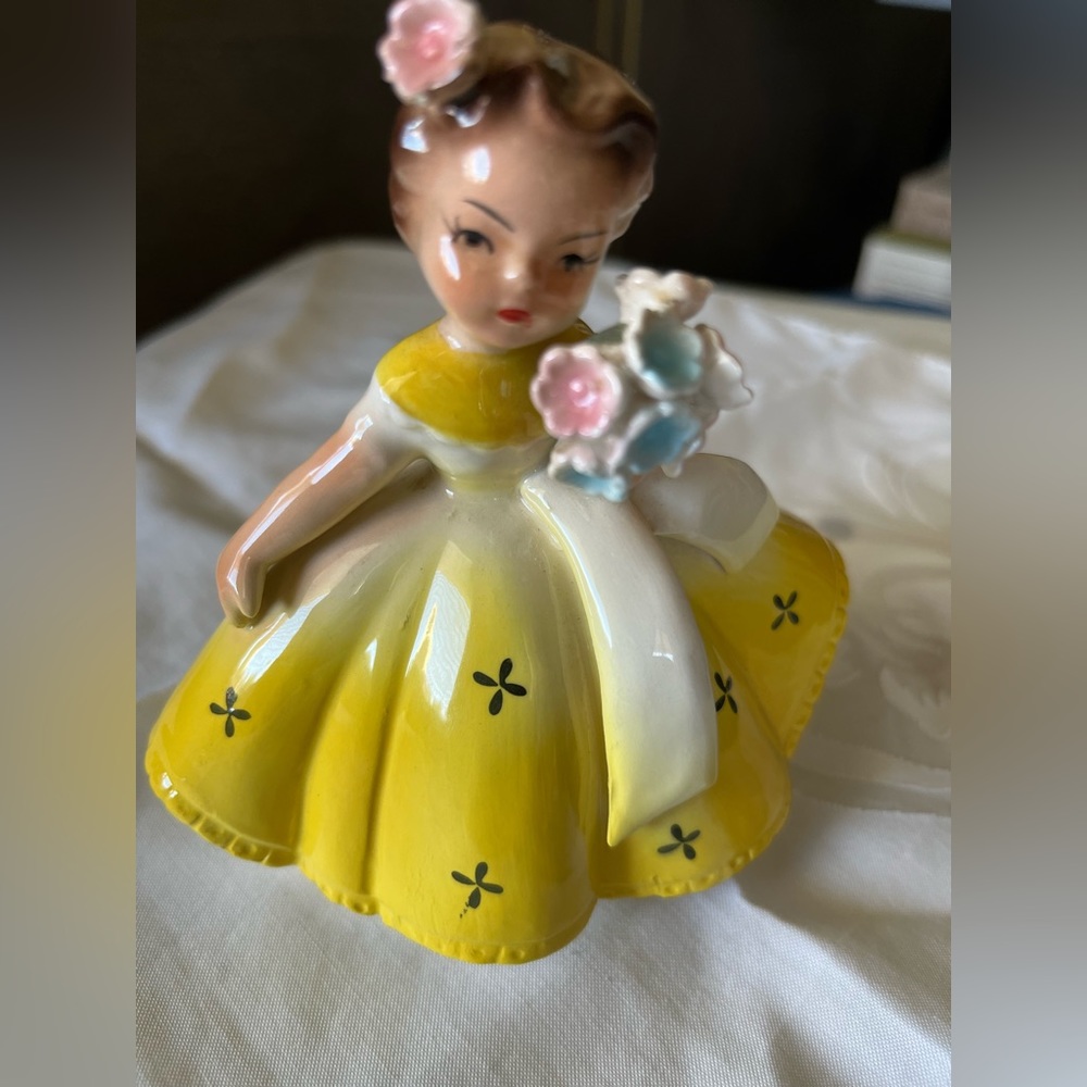 Beautiful Vintage Girl figurine holding Flowers w/ yellow dress